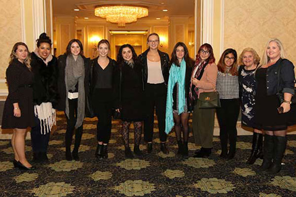 Students posing for picture in hall