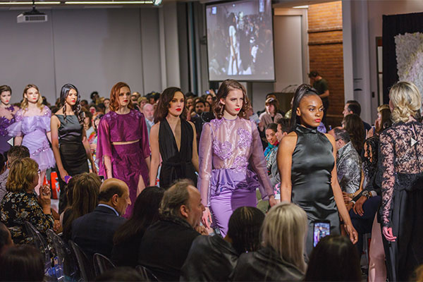 Models walking down the runway