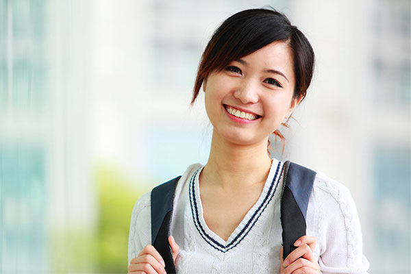 woman standing and smiling