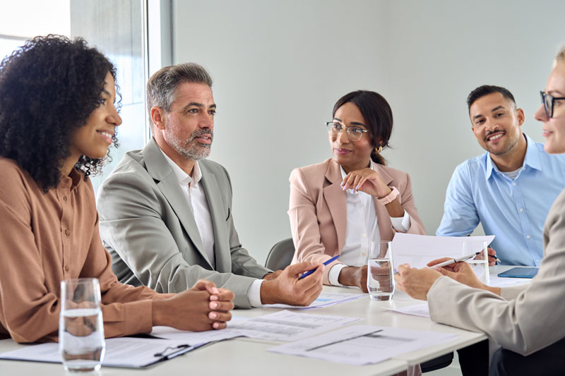 People in business office conducting interview