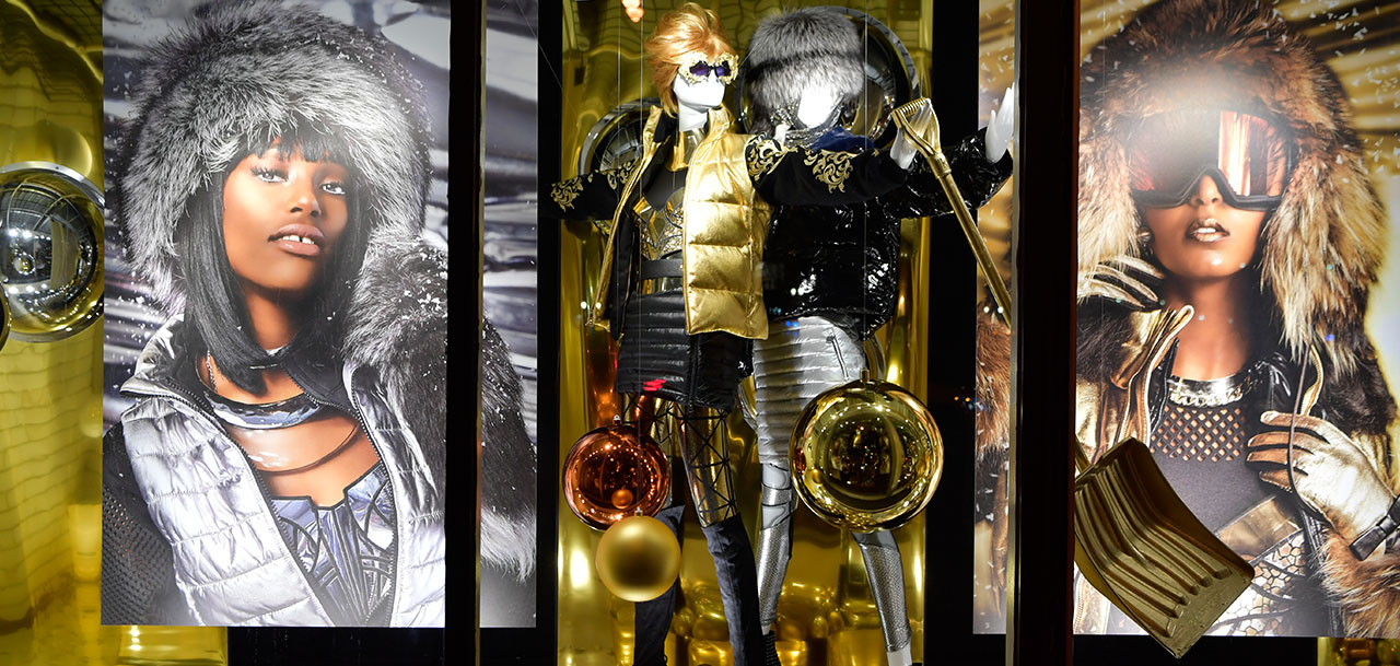 female mannequins dressed in gold and silver