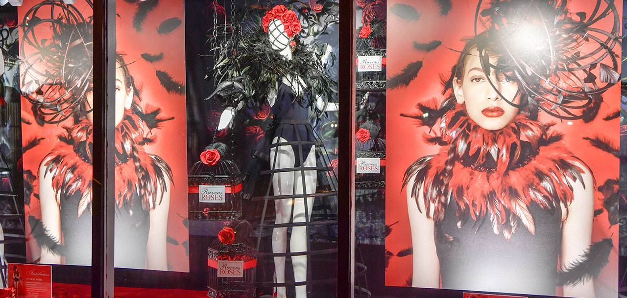 female mannequins with ravens and roses