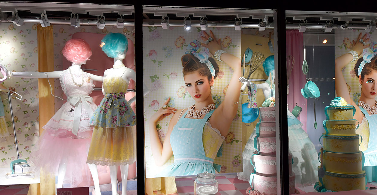 female mannequins in pastel dresses