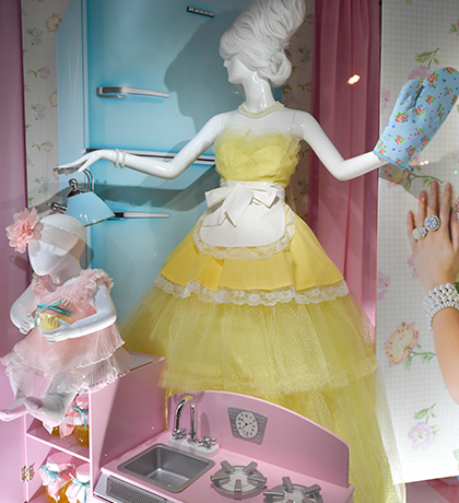 female mannequin in pastel dresses