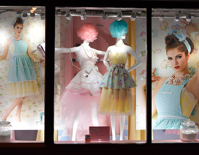 female mannequins in pastel dresses