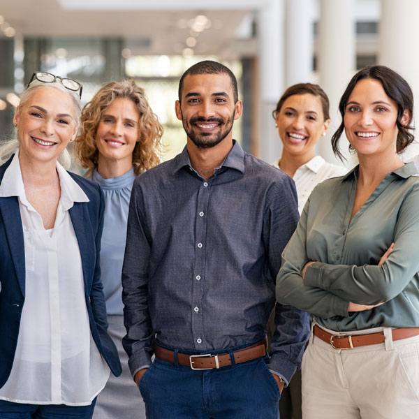 Five business people smiling