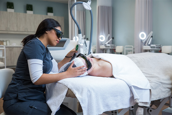 Person performing a facial