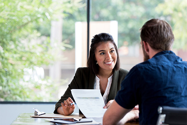 Person smiling in a meeting