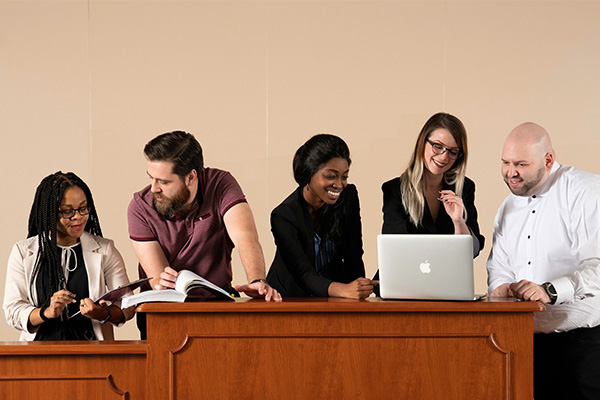 People working and smiling