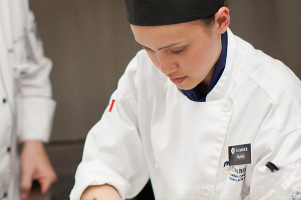 Student working in the kitchen