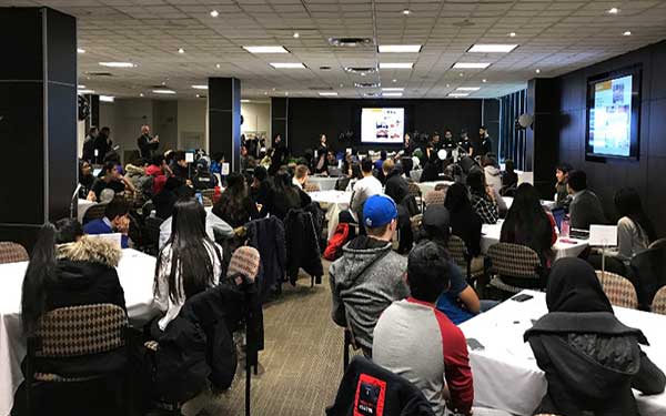 High school students competing in Cafe Wars