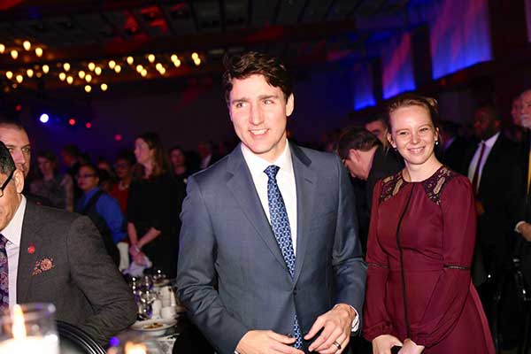 Justin Trudeau walking down an aisle