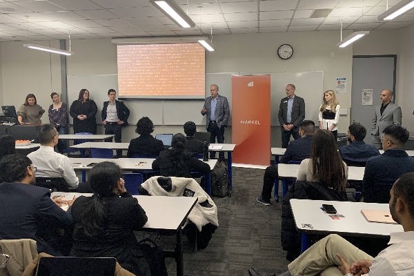 The Markel Canada team in a classroom speaking to Insurance Management students