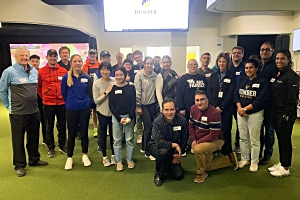 Humber faculty and staff members at the Golf Lab surrounded by Professional Golf Management students