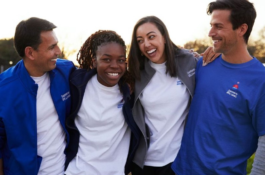 a group of diverse young people wearing Sherwin Williams uniforms