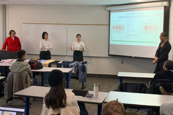 Fashion students presenting to classroom