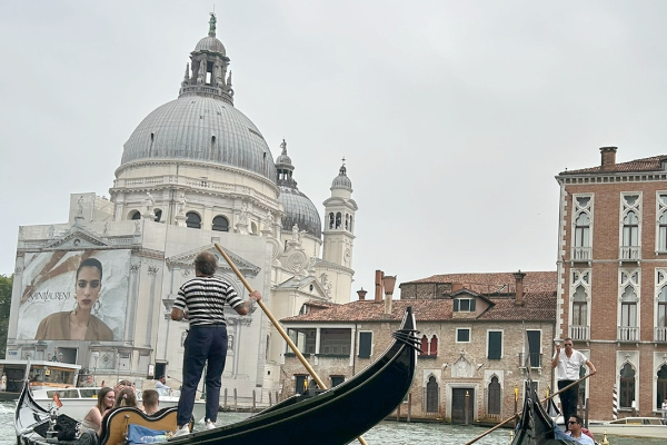 Man on a gondola in Florence