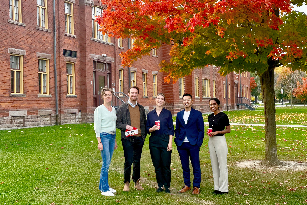 Saxion University representatives standing in front of Lakeshore campus