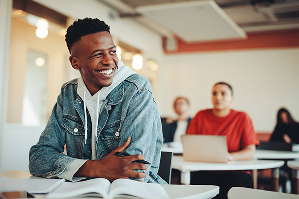 student smiling in classroom