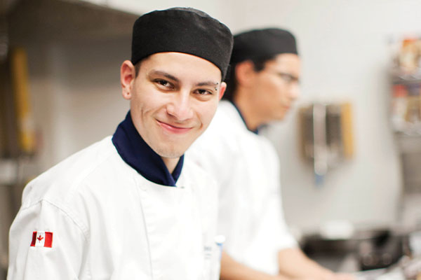 Student chef smiling