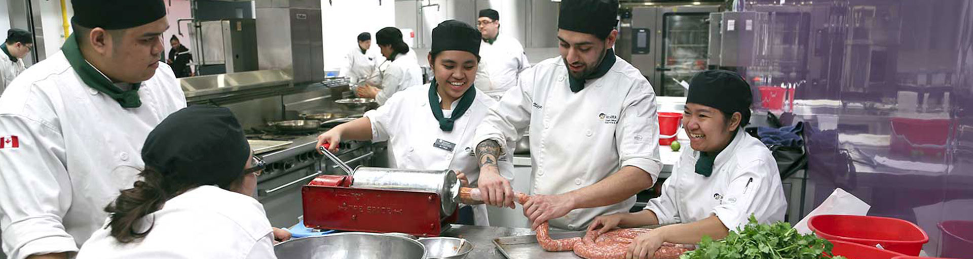 culinary students making sausage