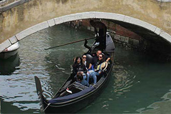 students sitting on a gondola 