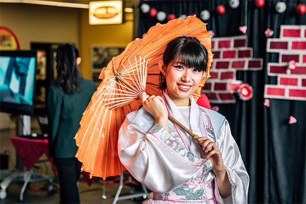 woman with paper umbrella