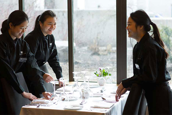 students working in restaurant