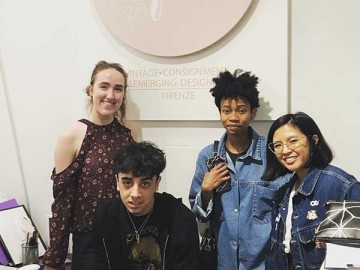 four students in an office