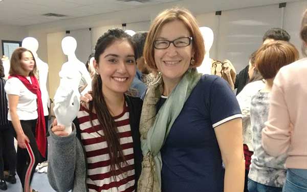 Student and faculty at 100 Years of Fashion 