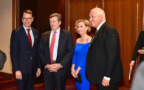 John Tory with two men and a woman