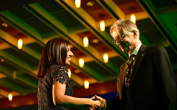 man and woman shaking hands