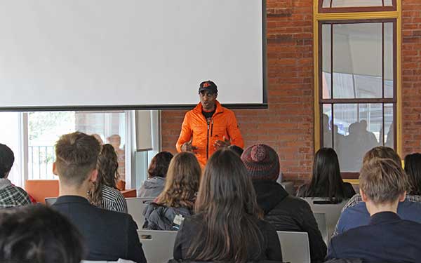 Clarence Ford lecturing at event