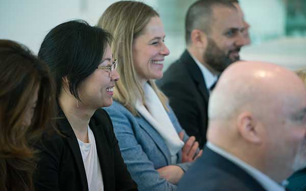 Audience watching Miele presentations 