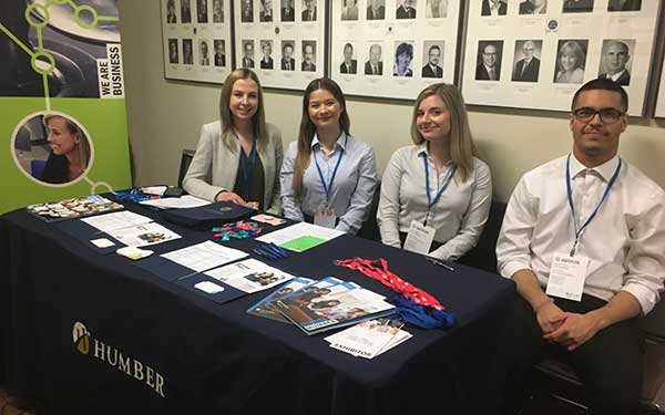 Paralegal students staffing OBE table