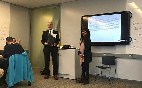 Peter is offered a thank you gift by our student Amandeep Sidhu