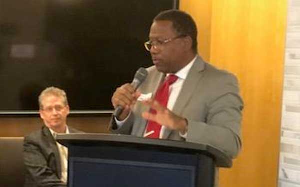 man speaking at student event