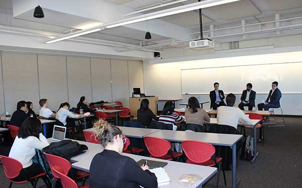 professionals speaking to a classroom of students