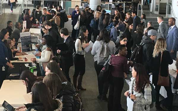 group of people networking at an event