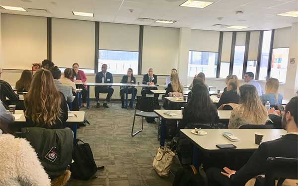 Panel of professionals address students