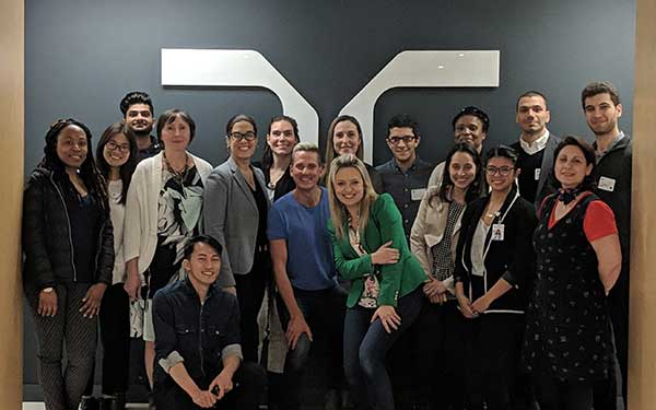 Students posing for picture in Randstad head office