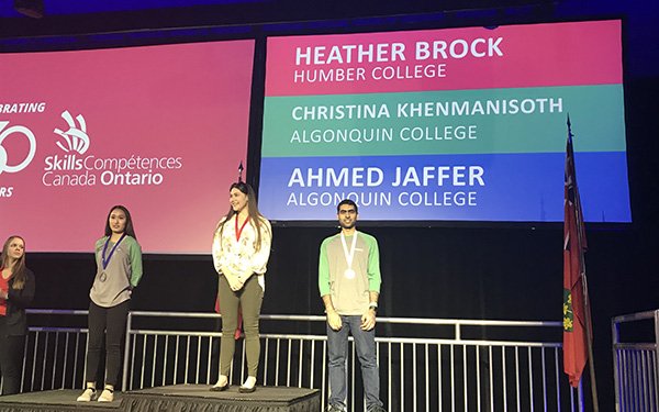 Heather Brock on first place podium at skills canada