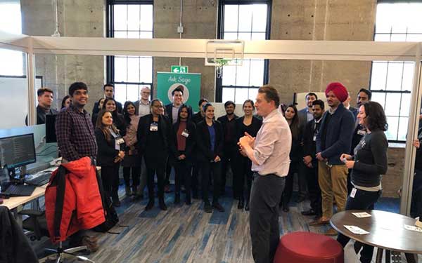 Students gathered in an office space
