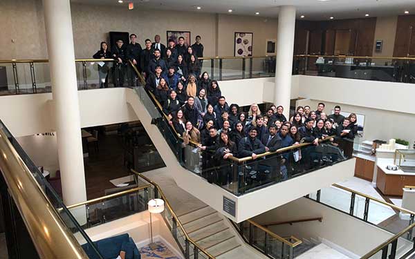 Group of people gathered on flights of stairs
