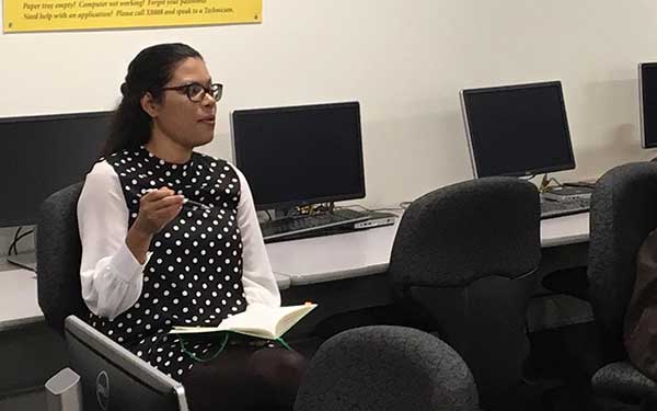 Woman sitting in classroom